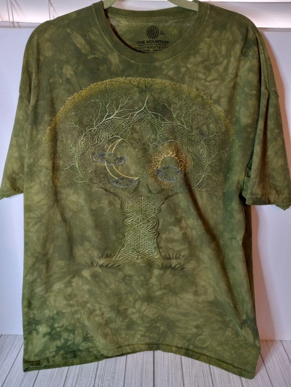 The Mountain green tie-dye cotton tee with tree graphic featuring moon and sun